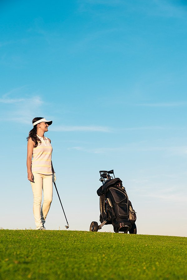 Woman playing golf